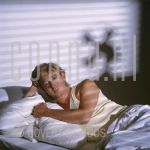 05-07-1985 Benny Neyman in studio te Amsterdam.

[keywords]Posed, Half Length, Eyecontact, Bed, Shadow[/keywords]